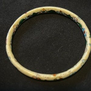 Bracelet. White with multi colored design